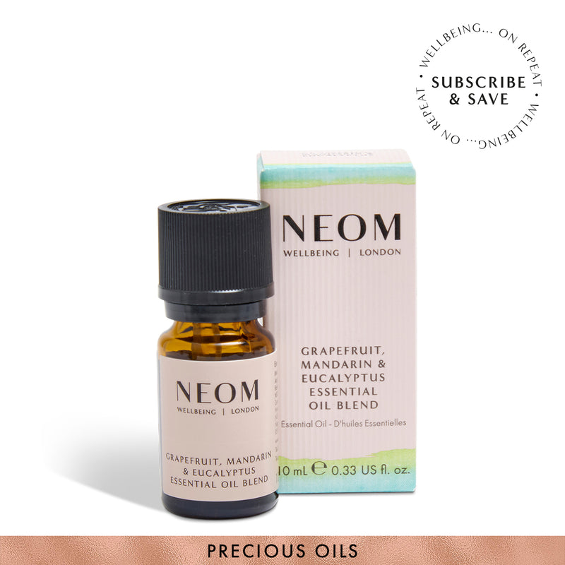 NEOM essential oil bottle and packaging on a white background