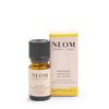 NEOM Happiness Essential Oil Blend bottle and packaging on a white background