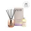 NEOM reed diffuser set with bottle and packaging on a white background