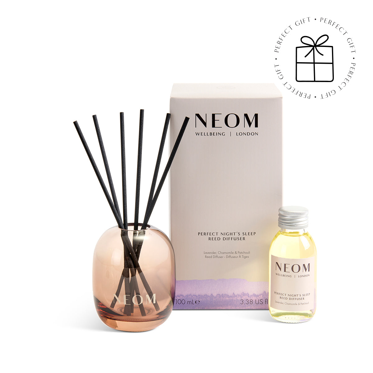 NEOM reed diffuser set with bottle and packaging on a white background