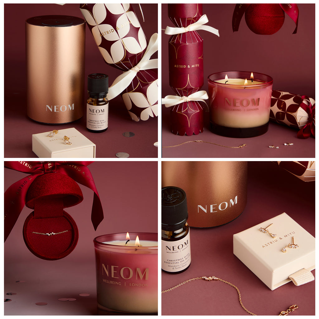 Collage of NEOM products including candles, oils, and jewelry on a maroon background.