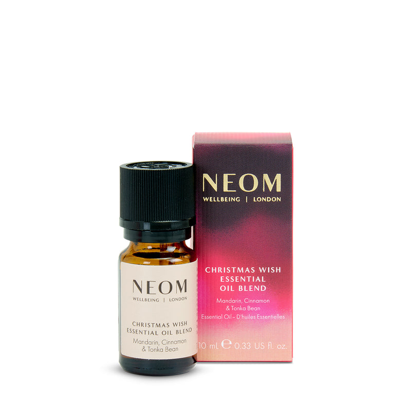 NEOM Christmas Wish Essential Oil Blend bottle and packaging on a white background