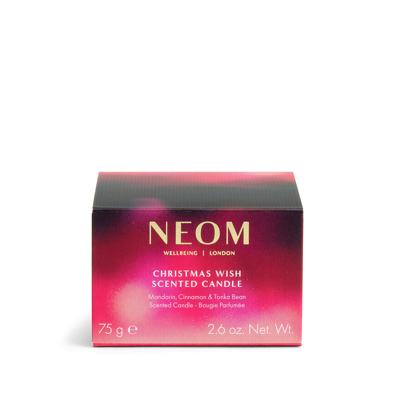 NEOM Christmas Wish scented candle packaging on a white background