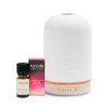 Neom diffuser and essential oil set on a white background