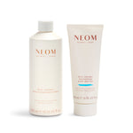 NEOM bath milk and body butter on a white background