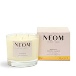 NEOM Happiness 3 Wick candle on a white background