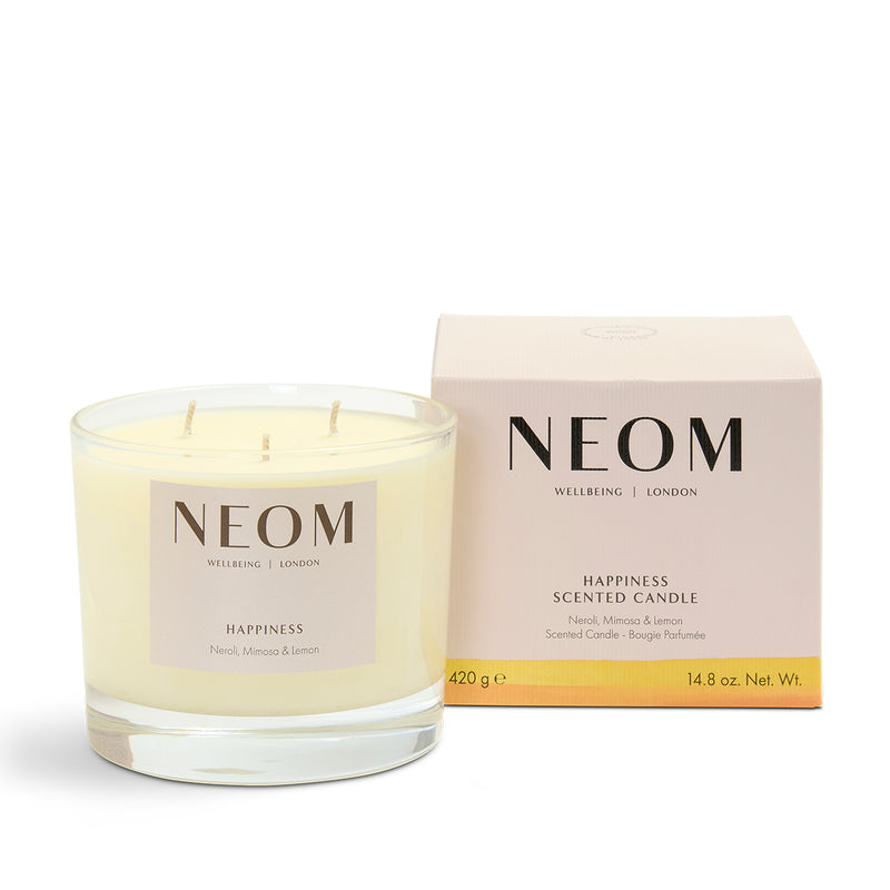 NEOM Happiness 3 Wick candle on a white background