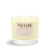 NEOM Happiness 3 Wick candle on a white background