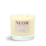 NEOM Happiness 3 Wick candle on a white background