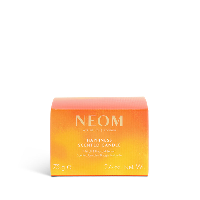 NEOM Happiness scented candle packaging on a white background