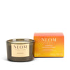 NEOM Happiness scented candle with packaging on a white background
