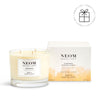 NEOM candle and packaging on a white background