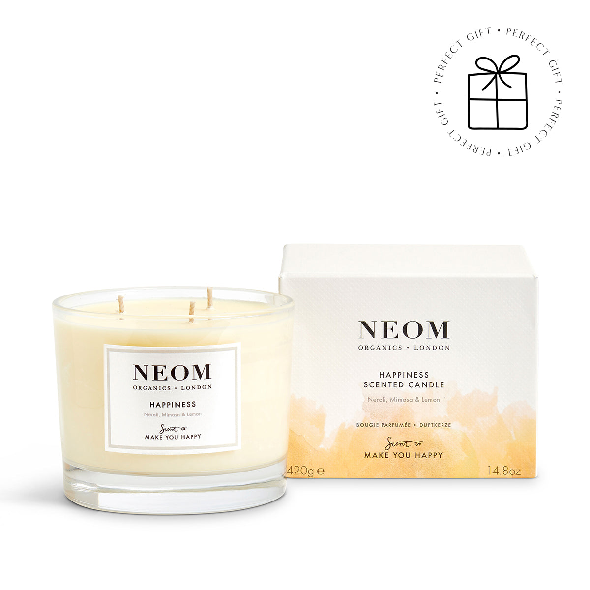 NEOM candle and packaging on a white background
