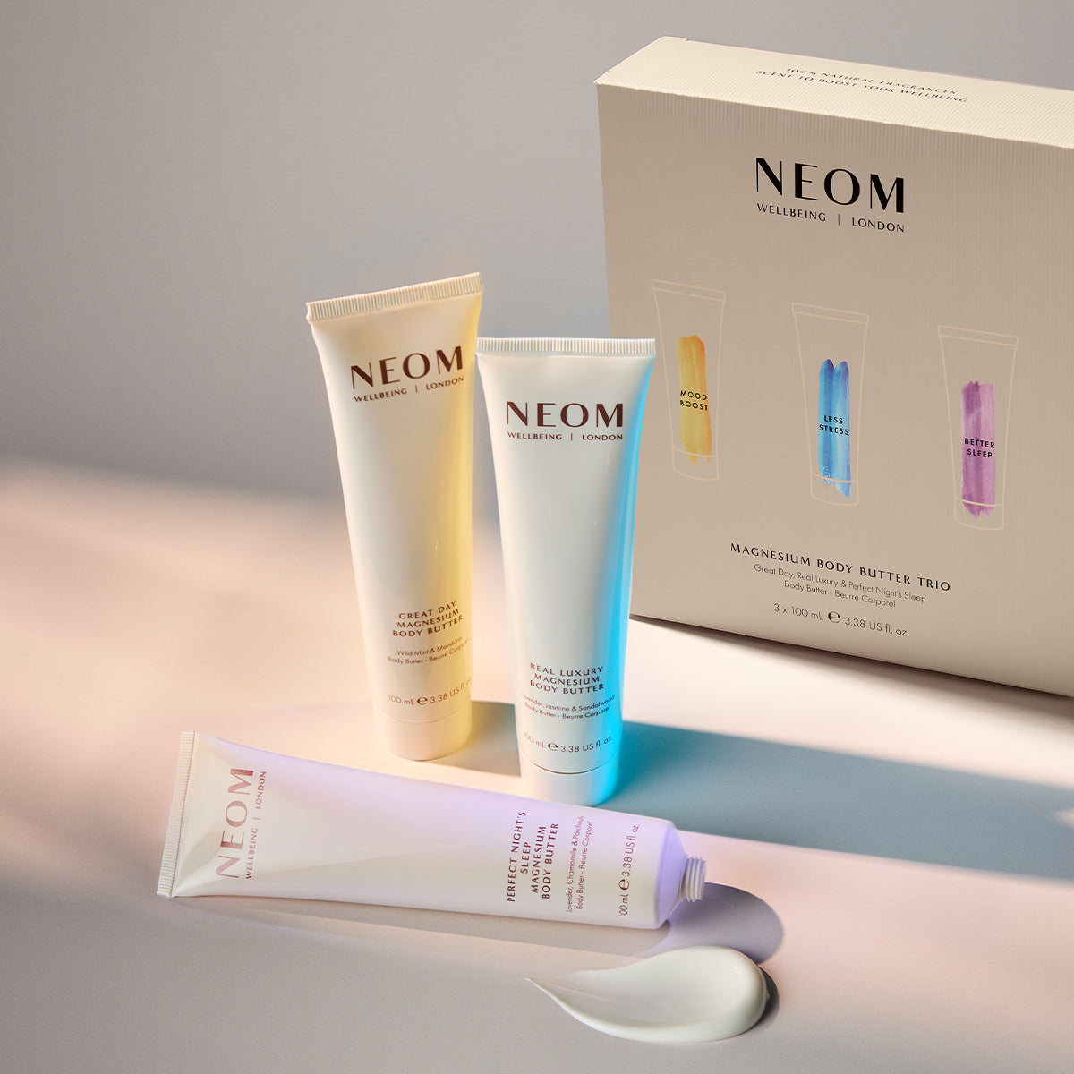 NEOM body butter products on a light background