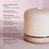 Neom diffuser with features listed on a light pink background