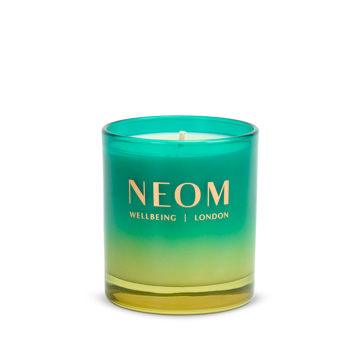 Neom candle with gradient green and yellow design on a white background