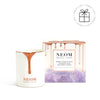 NEOM candle and packaging on a white background