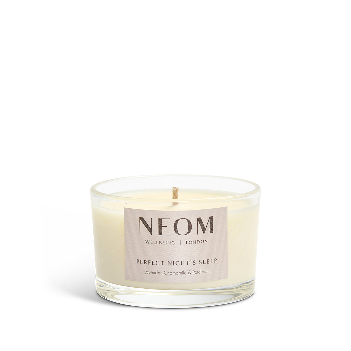 NEOM candle with a white background