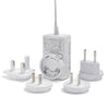 Set of multiple travel adapters on a white background