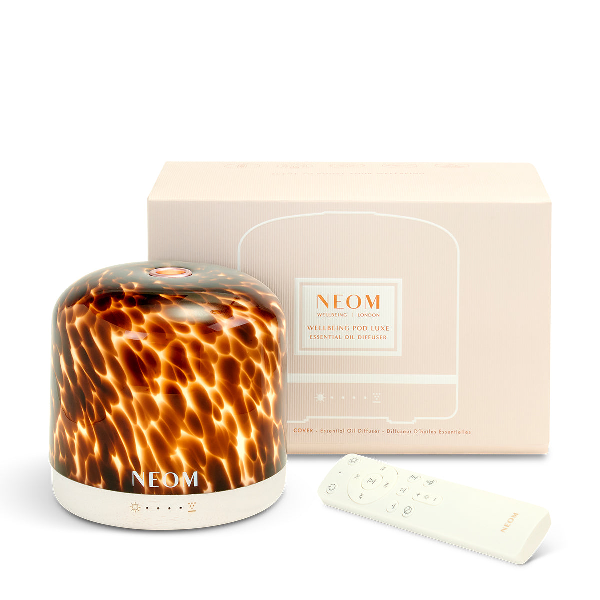 NEOM diffuser with packaging and remote control on a white background