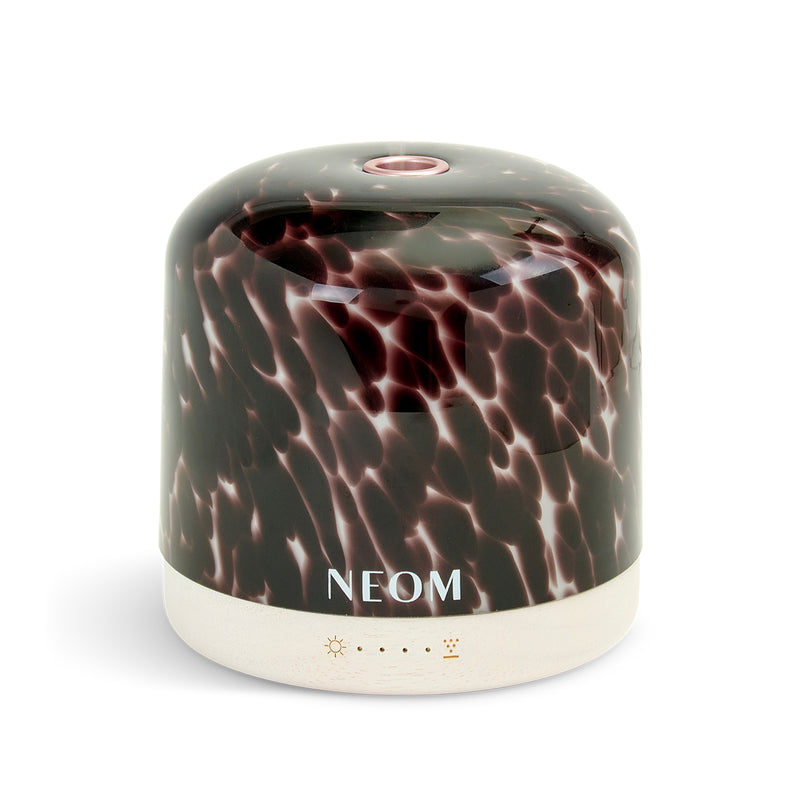 NEOM product with marbled design on a white background