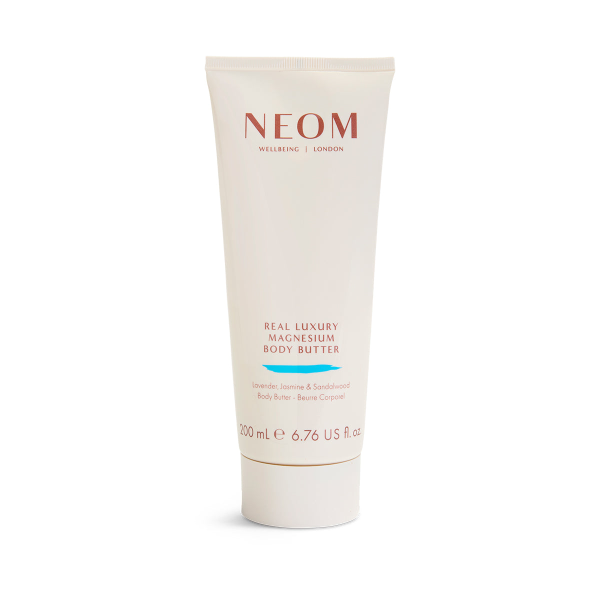 NEOM Real Luxury Magnesium Body Butter tube on a white background