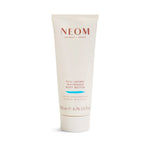 NEOM Real Luxury Magnesium Body Butter tube on a white background