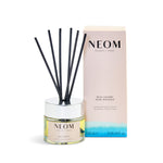 NEOM real luxury reed diffuser with packaging on a white background