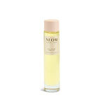 NEOM body oil bottle on a white background