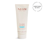 NEOM Real Luxury Magnesium Body Butter tube on a white background