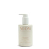 NEOM hand lotion bottle on a white background