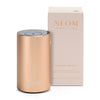 Neom rose gold wellbeing pod mini with packaging on a white background