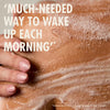 “Close-up of a person’s shoulder covered in soapy lather with a hand resting on the skin. Large text reads: ‘Makes my skin tingle but I feel so clean after using it.’ Small print: ‘*Based on customer reviews on www.neomwellbeing.com.’