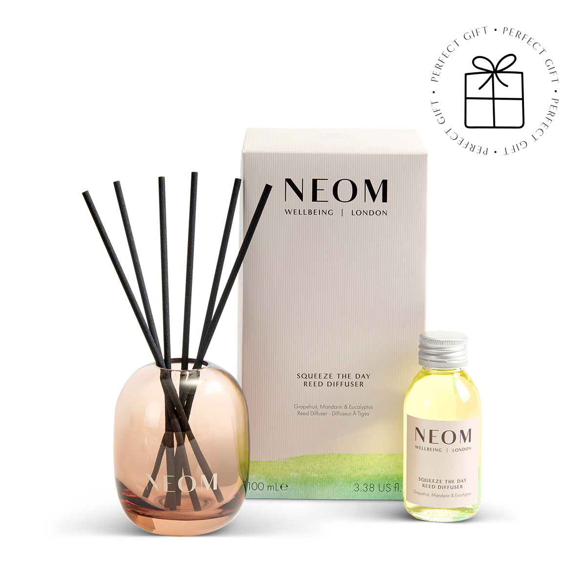 NEOM reed diffuser set with diffuser and bottle on a white background