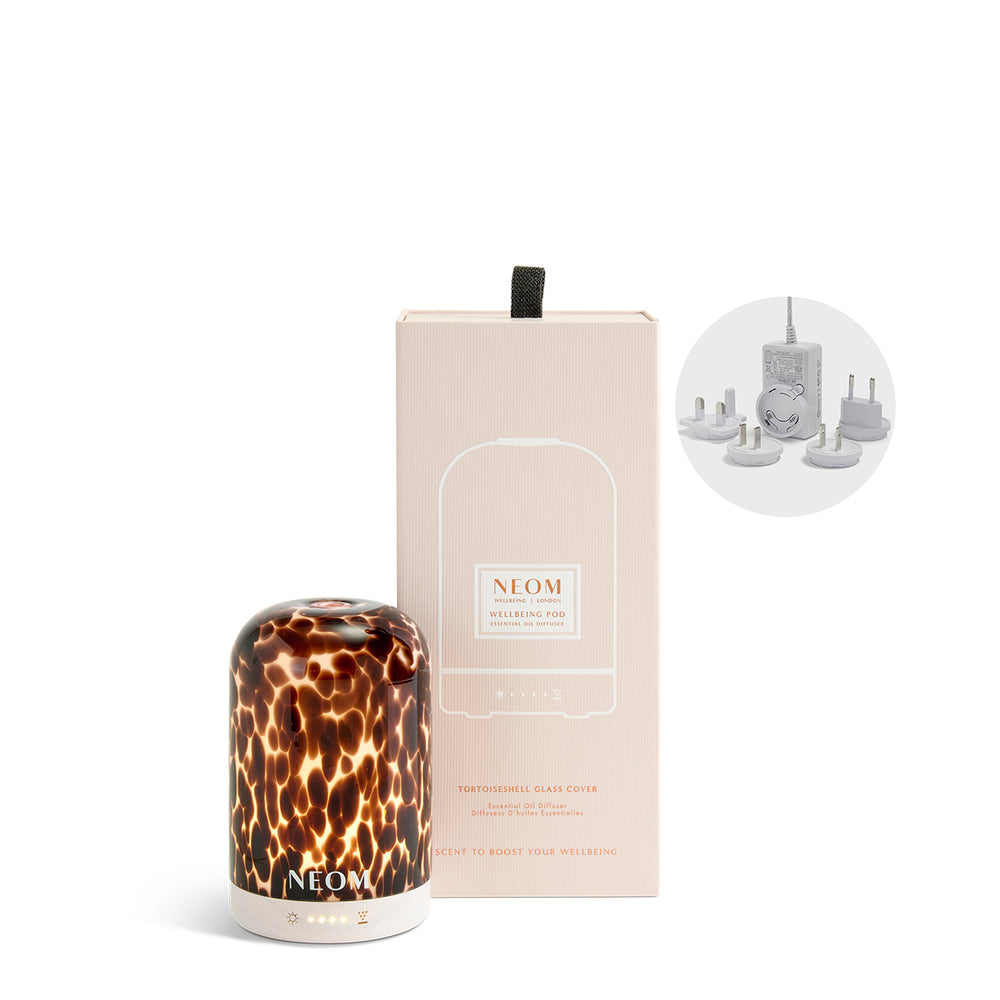 NEOM diffuser with packaging on a white background