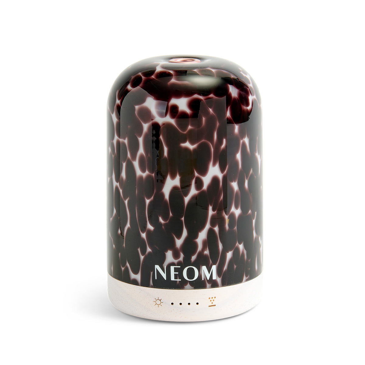 NEOM diffuser with a black and white pattern on a white background