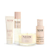 NEOM skincare and wellness products on a white background