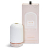 White ceramic diffuser with packaging on a white background