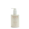 NEOM hand lotion bottle on a white background