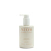NEOM hand lotion bottle on a white background