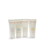 NEOM moments of wellbeing in the palm of your hands on a white background